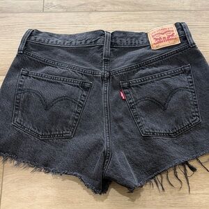 Levis woman’s 501 black denim cutoff shorts  size 30” festival concert